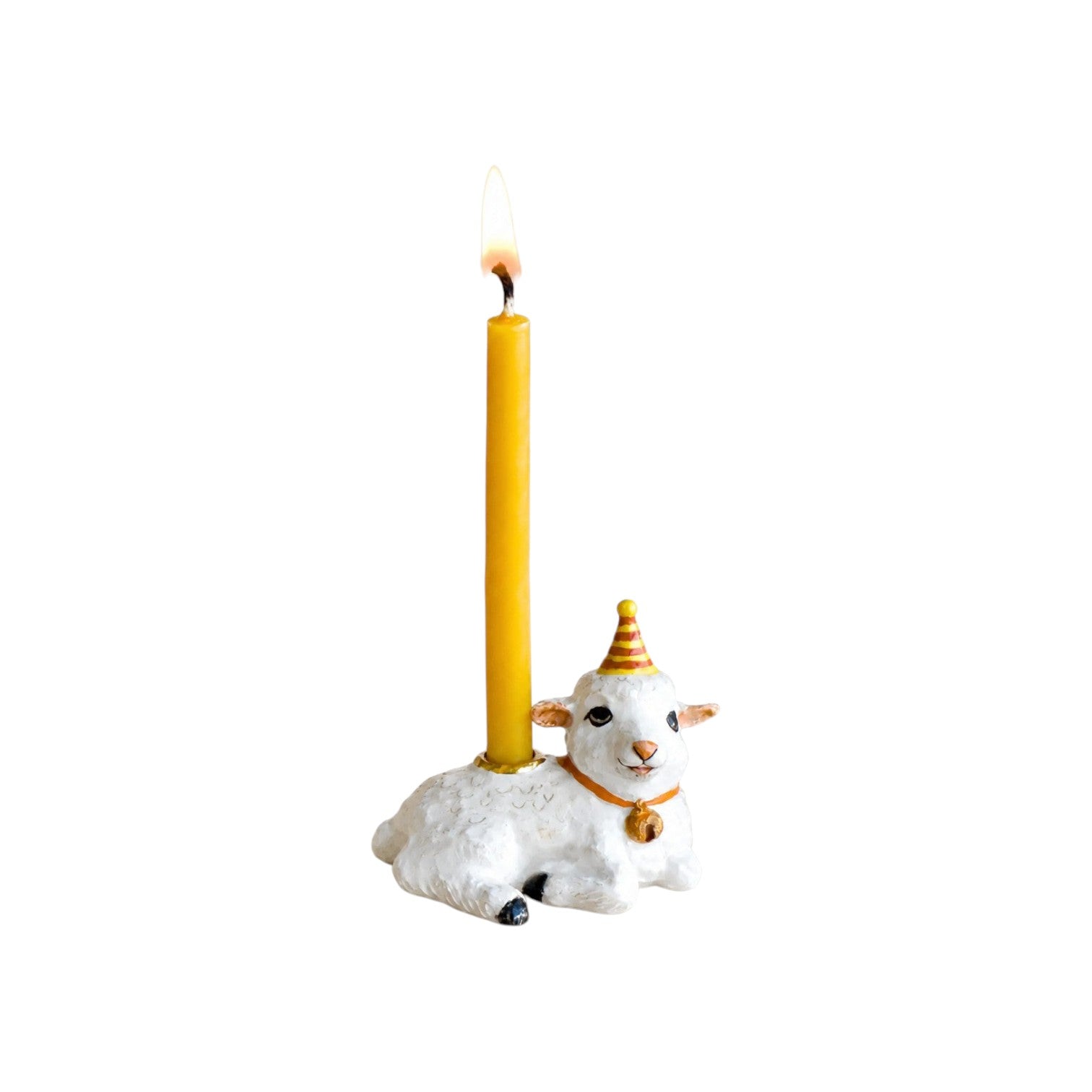 The Tiny Finch porcelain goat cake topper wearing a party hat with a lit yellow candle, hand-painted zodiac figure.