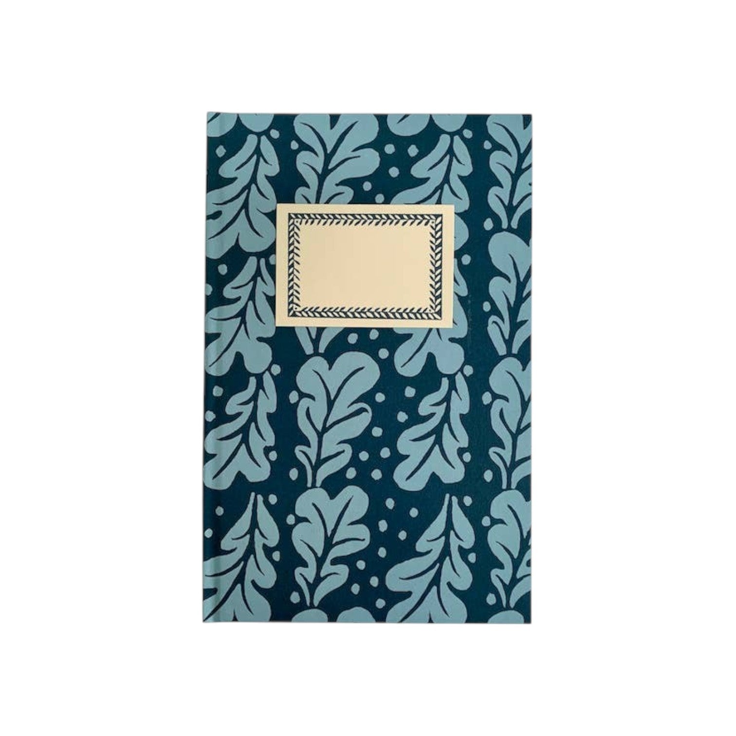 The Tiny Finch Quercus Midnight hardback notebook with a dark blue oak leaf pattern and a cream front label.