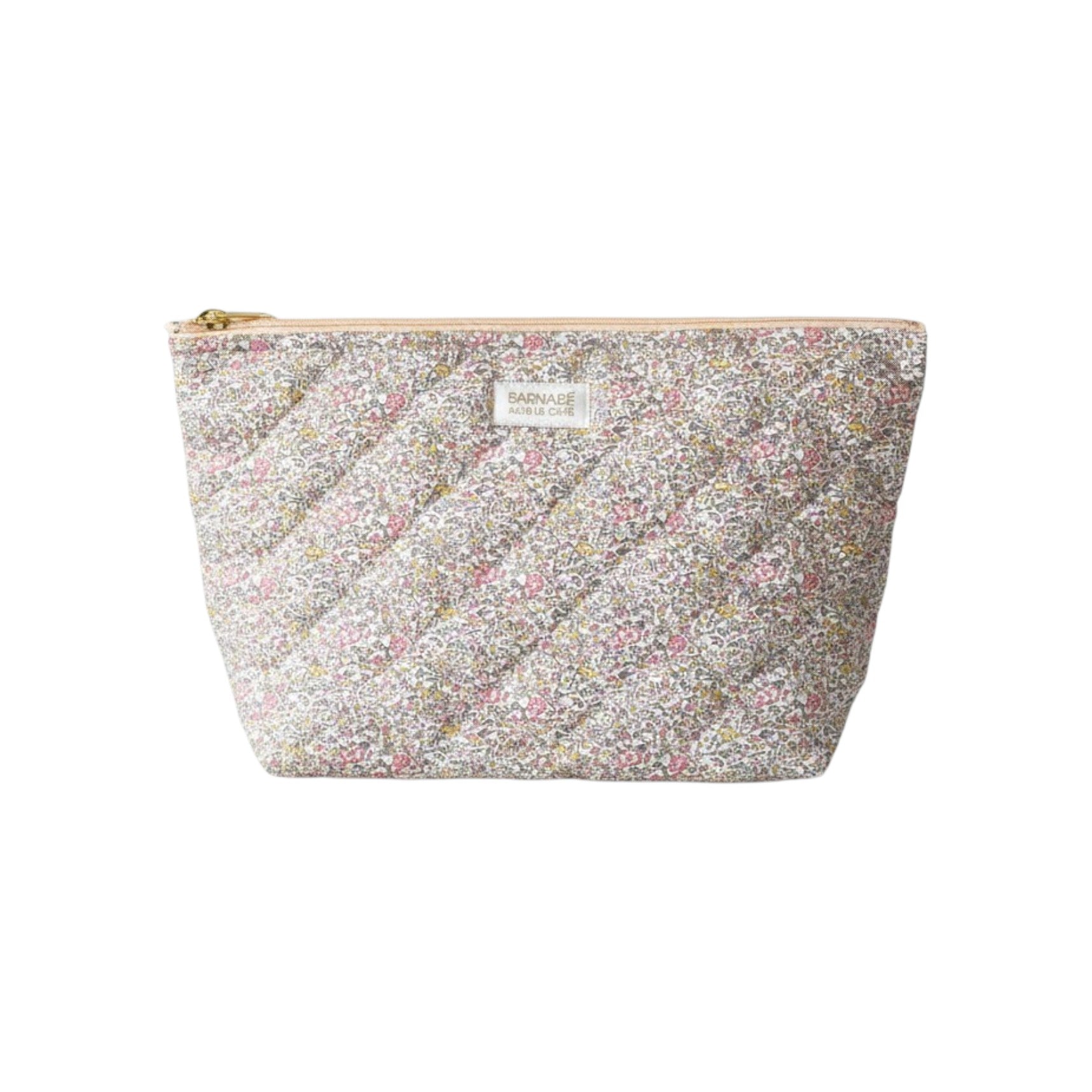 The Tiny Finch Juliette baby toiletry bag in quilted floral Liberty fleece fabric with a gold zipper closure.