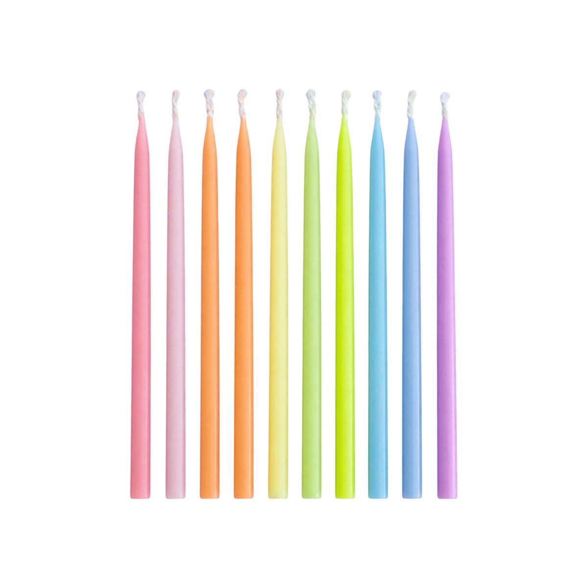 The Tiny Finch set of 12 pastel rainbow tapered candles in soft ombré hues for cakes and decorative candle holders.