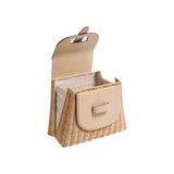 The Tiny Finch Lady Latte handwoven rattan bag with embossed lizard leather flap and top handle in a neutral beige.