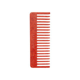 The Tiny Finch Comb Poppy in red marbled Italian acetate, a wide-tooth hair comb for all hair types.