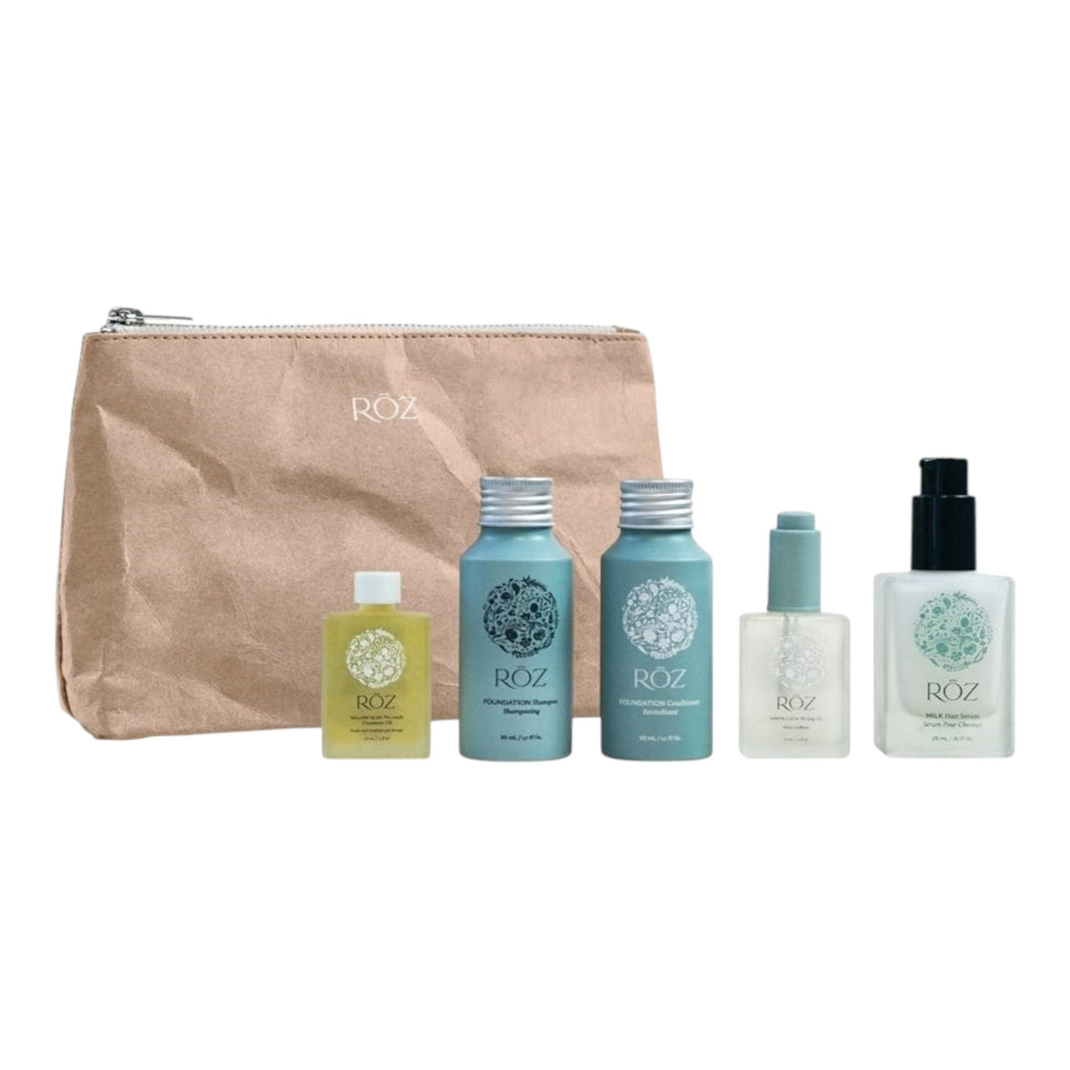 The Tiny Finch Roz Discovery Kit featuring five luxury hair care travel-sized bottles and a reusable beige pouch.