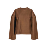 The Tiny Finch Bailey Renee Intent Top in sable brown cotton knit with relaxed fit and gathered sleeves.