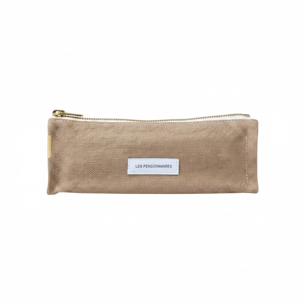 The Tiny Finch Les Pensionnaires sand beige organic cotton canvas pencil case with a gold zipper closure.