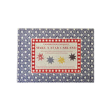 The Tiny Finch Make A Star Garland kit in a blue patterned card wallet with red and white star design details.