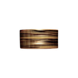 The Tiny Finch French Pony Barrette in brown and gold Tiger’s Eye patterned Italian acetate with a sleek cuff design.