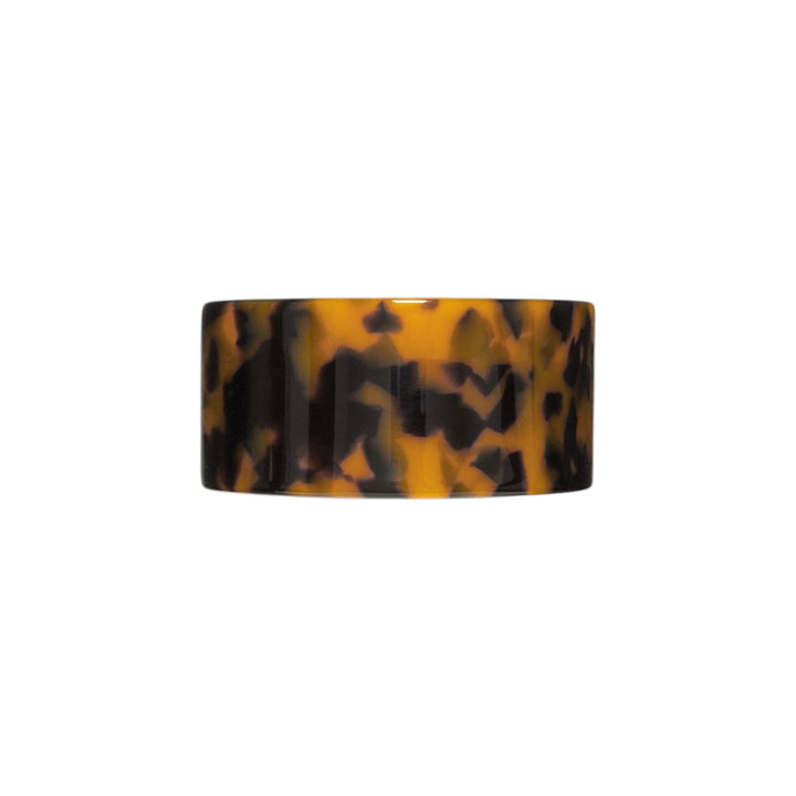 The Tiny Finch French Pony barrette in classic tortoise shell Italian acetate with a stainless steel clasp.