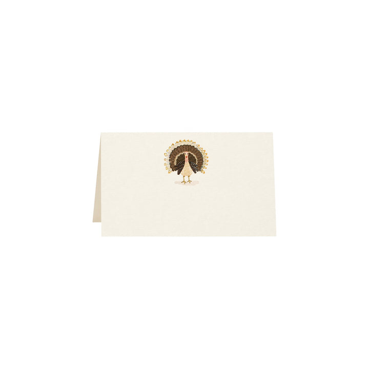 The Tiny Finch Gobble place card featuring a turkey illustration with gold foil and glitter on natural white paper.