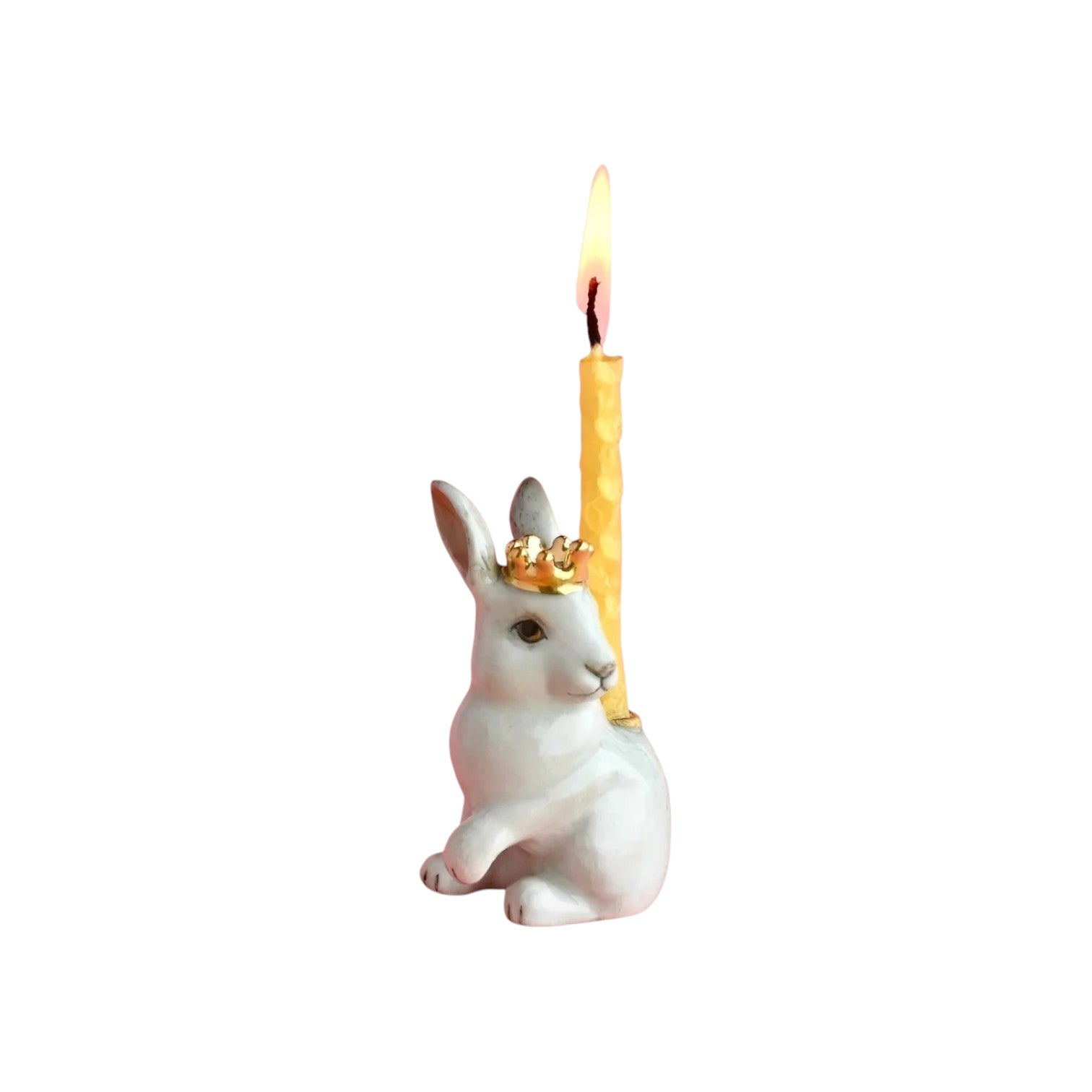 The Tiny Finch white rabbit cake topper wearing a gold crown with a lit yellow taper candle in a whimsical style.