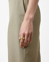 The Tiny Finch Zoe ring featuring a sculptural layered design in mixed 925 sterling silver and 18k gold-plated metal.