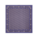 The Tiny Finch Moismont Milan square cotton scarf in twilight blue with intricate ecru patterns and rolled edges.