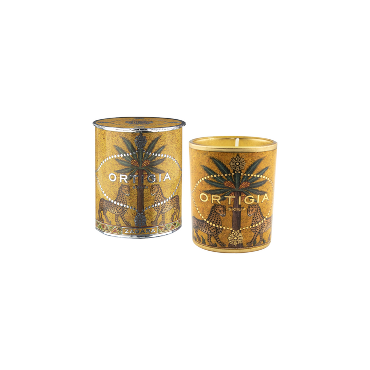 The Tiny Finch Zagara orange blossom scented candle in a decorative jar with palm and leopard print and golden wax.